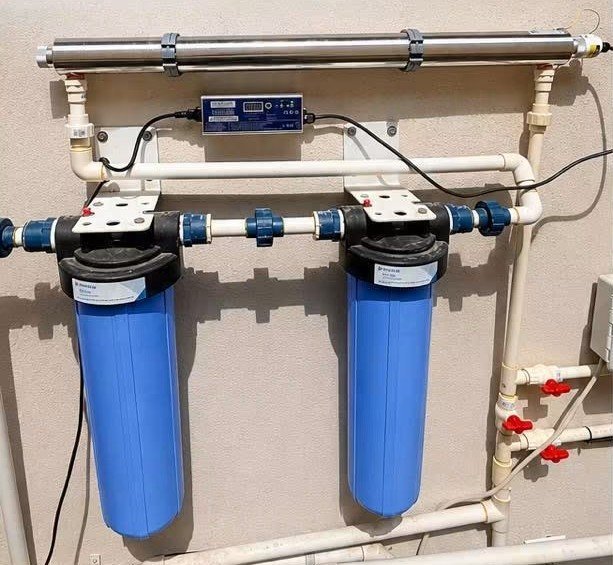 Whole home filtration system with UV sterilizer